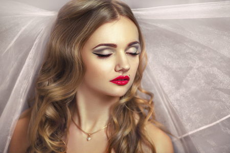 Perfect Bride with golden hair. Dreams. Desire. Beautiful beautiful, pretty. professional photo, portrait, photo model face, red lips, closed eyes, enjoyment, delight, pleasure. Lady girl female missの写真素材