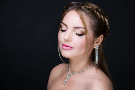 Closeup portrait, beautiful girl woman lady, professional make up, hair styling. Luxury accessory jewelry, New Bright color makeup, shiny lipstick glossy cosmetics. Young pretty photo model vip personの写真素材