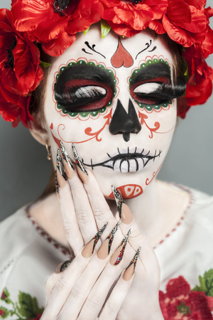 New creative calavera is a representation of human skull. applied to decorative make up the Mexican celebration of the Day of the Dead Dia de los Muertos and the Roman Catholic holiday All Souls Dayの写真素材