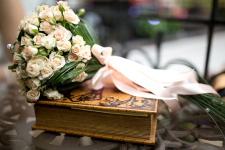 Goods for wedding: Bouquet and two Rings, Book.の写真素材