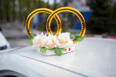 Big Bouquet and Two Wedding Rings. Goods for wedding. This photo is perfect for magazines, shops dealing with wedding dresses ceremonies bride groom marriage jewelry. Can be used for poster or websiteの写真素材