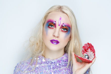 Closeup portrait beautiful girl woman lady with volume mat of hair-do styling. Luxury long blond hair. Bright makeup, shiny lip-gloss new lipstick. Professional photo model person horizontal bannerの写真素材