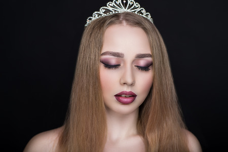 Closeup portrait of beautiful girl with volume hair styling. Luxury blonde straight hair. Good new photo for advertising shampoo conditioner hair dryer beauty salon studio hairdresser. bright makeupの写真素材