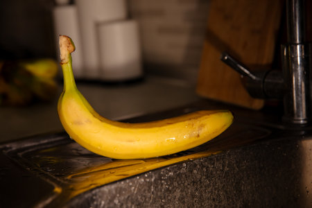 Ripe Bananas on a Table: Colorful and Healthy Fruit Stock Photographyの写真素材