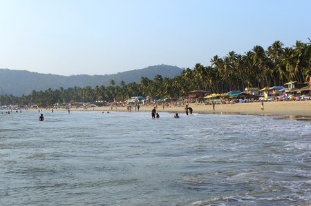 GOA, INDIA - FEBRUARY 27, 2014: locals and tourists relax on the beach Palolem, february 27, 2014 in Goa, India.のeditorial素材