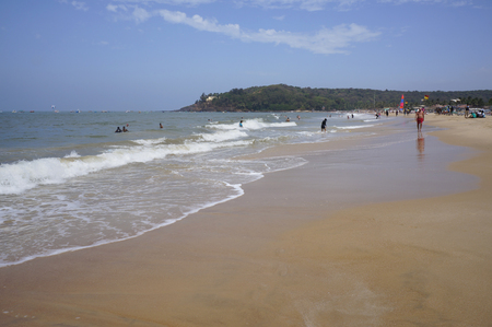 GOA, INDIA - FEBRUARY 27, 2014: locals and tourists relax on the beach Baga, february 25, 2014 in Goa, India.                               のeditorial素材