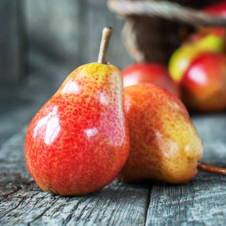 Still Life with Two Pears on the dark wooden tableの写真素材