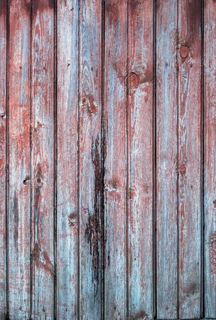 Old Wooden Planks in the Row of red and blue color, backgroundの写真素材