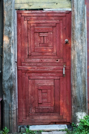 Old Rural Door of red color, retroの写真素材