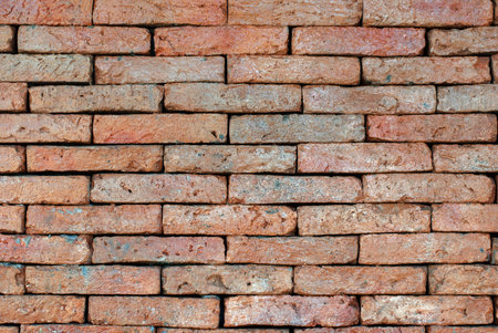 Porous red bricklaying without filling with cement, background