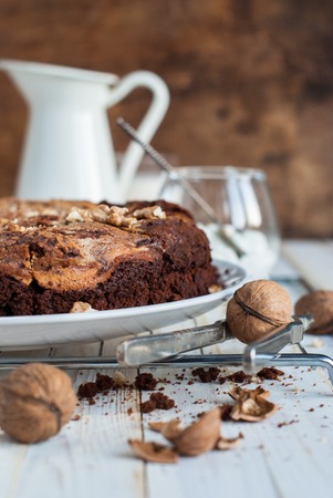 Wet Chocolate Cake Brownie with Cottage cheese, Walnuts on Wooden Tableの写真素材