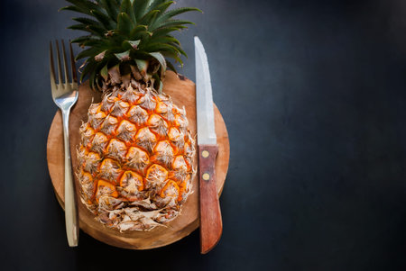Fruit Fresh Pineapple on Black Background Fork Knife Chopping Board Diet Concept Top Veiw