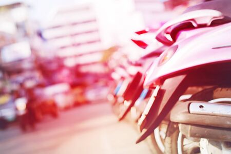 Many Motorbikes Row Abstract Urban Blurred Street City Background Red Shine Tonedの写真素材