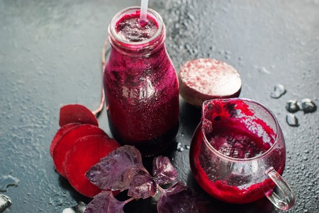 Fresh Juice Beet Smoothie Vegetables Violet Color Glass Bottles Black Background Selective Focusの写真素材