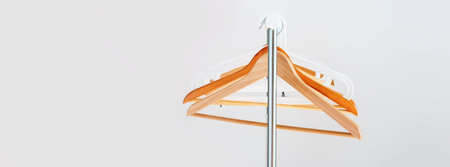 Nothing To Wear Design Sale Concept Wooden Coat Hanger Open Cloth Rail Grey Wall Copy Space Long...