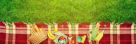 Basket Setting Food Apples Bread Fruit Drink Juice Cheese Pears Banana Checkered Plaid Picnic Green Grass Summer Time Rest Background Bannerの写真素材