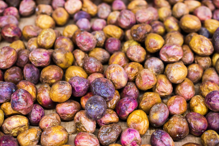 passion fruit tropical natural backgroun texture on laid out marketの写真素材