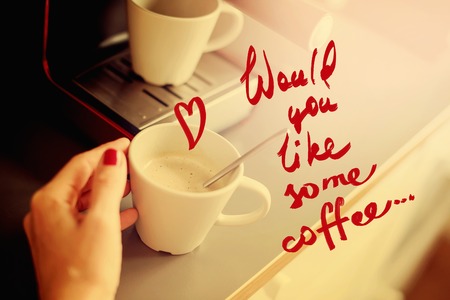 Text Would You Like Some Coffee Espresso Pouring from Machine Home Made Cooking Toned Hand Hold Cupの写真素材