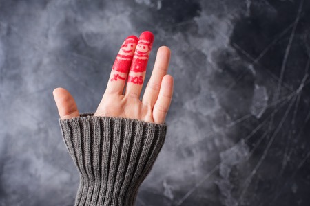 Finger Art Friends Celebrates Christmas Hand in Woolen Sweater Concept Group People Laughing New Year Clothes Copy Spaceの写真素材