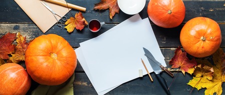 close up view hollow pumpkin knife object preparation to halloween holiday black background top viewの写真素材