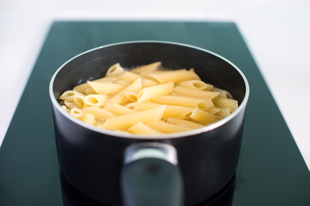 Paste Cooks Stove Black Pan Cooking Processの写真素材