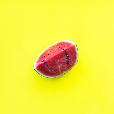 Water Melon One Whole Tropical Fruit Yellow Background Object Useful Natural Organic Food Style Minimalism Top View Flat Layの写真素材
