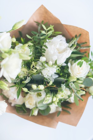tender bouquet white roses decorated top view pastel tonedの写真素材