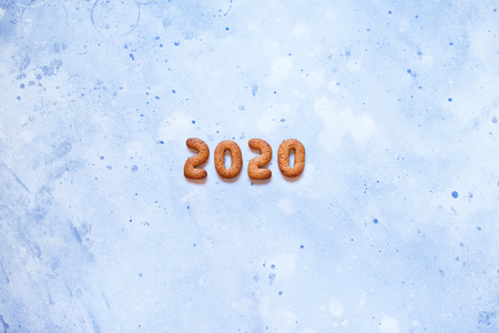 Figures 2020 Merry Christmas from gingerbread cookies top view copy spaceの写真素材