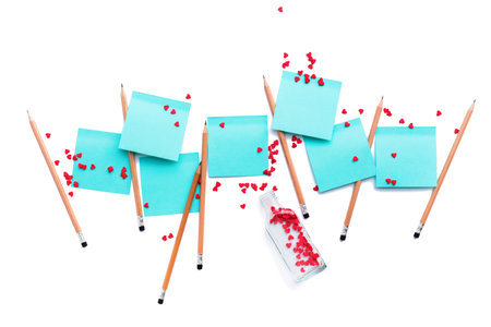 Empty blue paper stickers notes for message recognition isolated on white. Tradition for Valentine day holiday.の写真素材