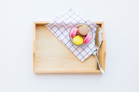 Light wooden tray with macaroons Concept sweet life. Top view. Top viewの写真素材