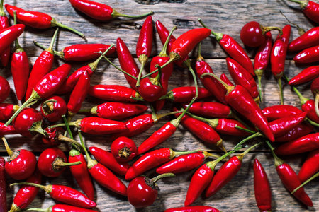 Red hot chili pepper on wooden background. Country style