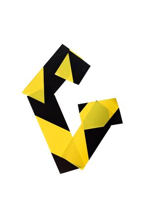 Letter G from yellow and black warning tape isolated on white background. Caution lines. Danger and risk sticky tape. Police stripe line. Industrial protectionの写真素材