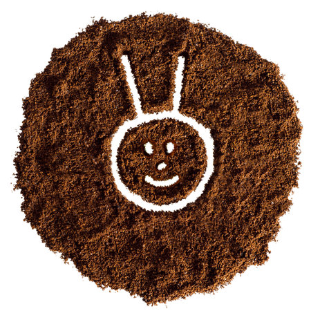 New year 2023 from coffee drawn on a white background from ground coffee, year of the rabbitの写真素材