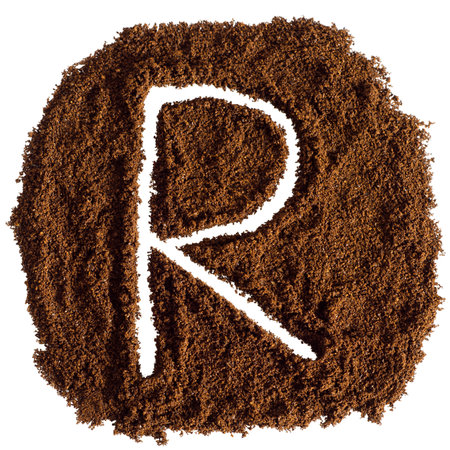 Coffee powder in shape of letter R isolated on white backgroundの写真素材