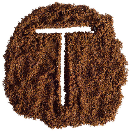 Alphabet made from ground coffee isolated on white background. Letter Tの写真素材