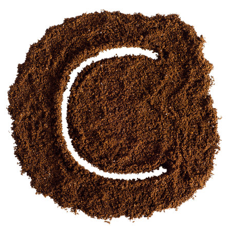 C letter made from ground coffee isolated on white background. top view.の写真素材