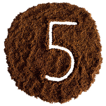 Coffee powder on white background. Number 5, five.の写真素材