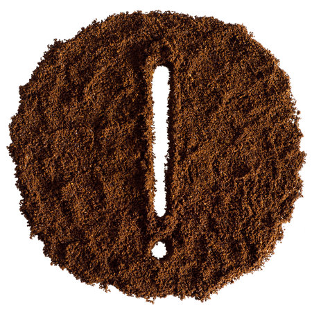 Exclamation mark made from ground coffee, isolated on white background.の写真素材