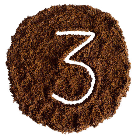 Number three from ground coffee isolated on white background with clipping path.の写真素材