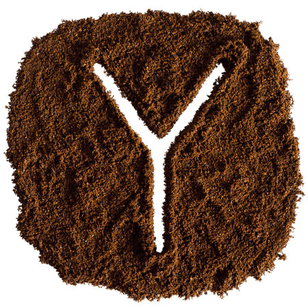 Alphabet made from ground coffee isolated on white background. Letter Yの写真素材