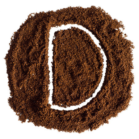 Coffee powder alphabet isolated on white background. Letter D.の写真素材