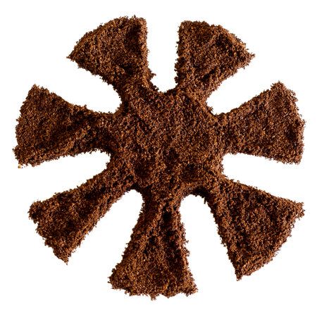 Coffee star made from ground coffee isolated on white background.の写真素材