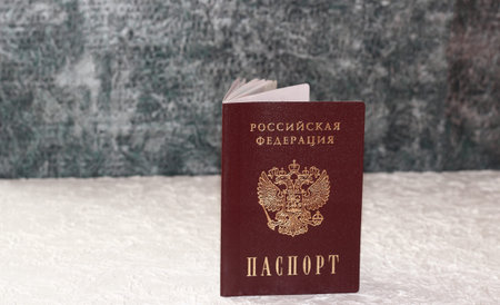 Passport of the Russian Federation on a light background. The inscription in Russian: Russian...