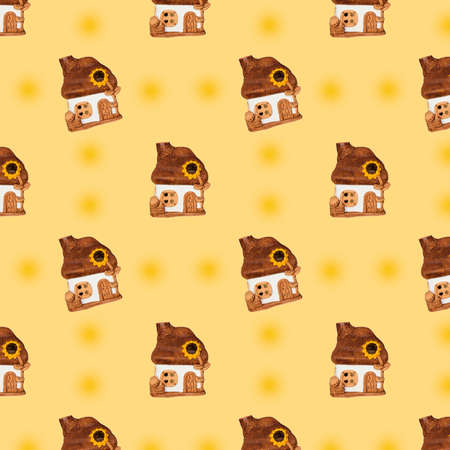 Pattern with a house. Toy house on a yellow background.の写真素材