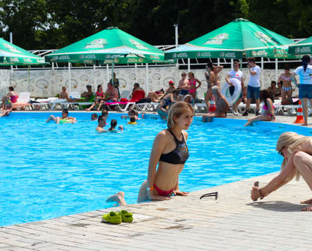 Selfie of girls near the pool. Photo on your phone. Donbass 07/03/2020のeditorial素材