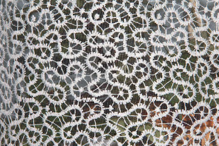 White openwork background. Texture with lace on a black backgroundの写真素材
