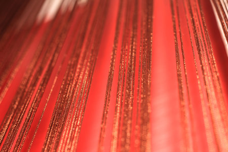 Red background with laces. Bright Burgundy background.