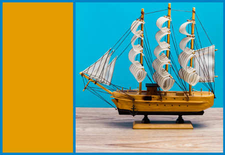 Souvenir boat on a blue background. Marine background.