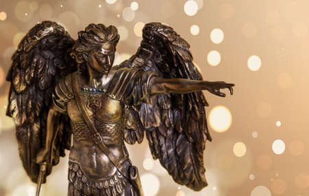 The figure of the Archangel Michael on an abstract background.の写真素材