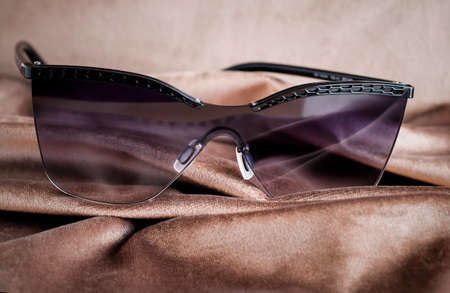 Glasses for the sun with a gradient on a velor background. Women's glasses "Butterfly".の写真素材